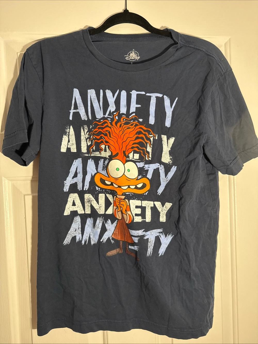 Disney Navy Graphic Tee with Orange Character and Cream Lettering
